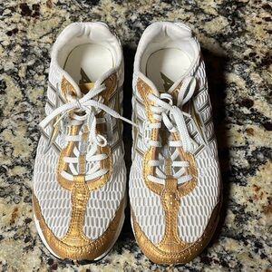 Avis size 7 ladies gold and white sneakers